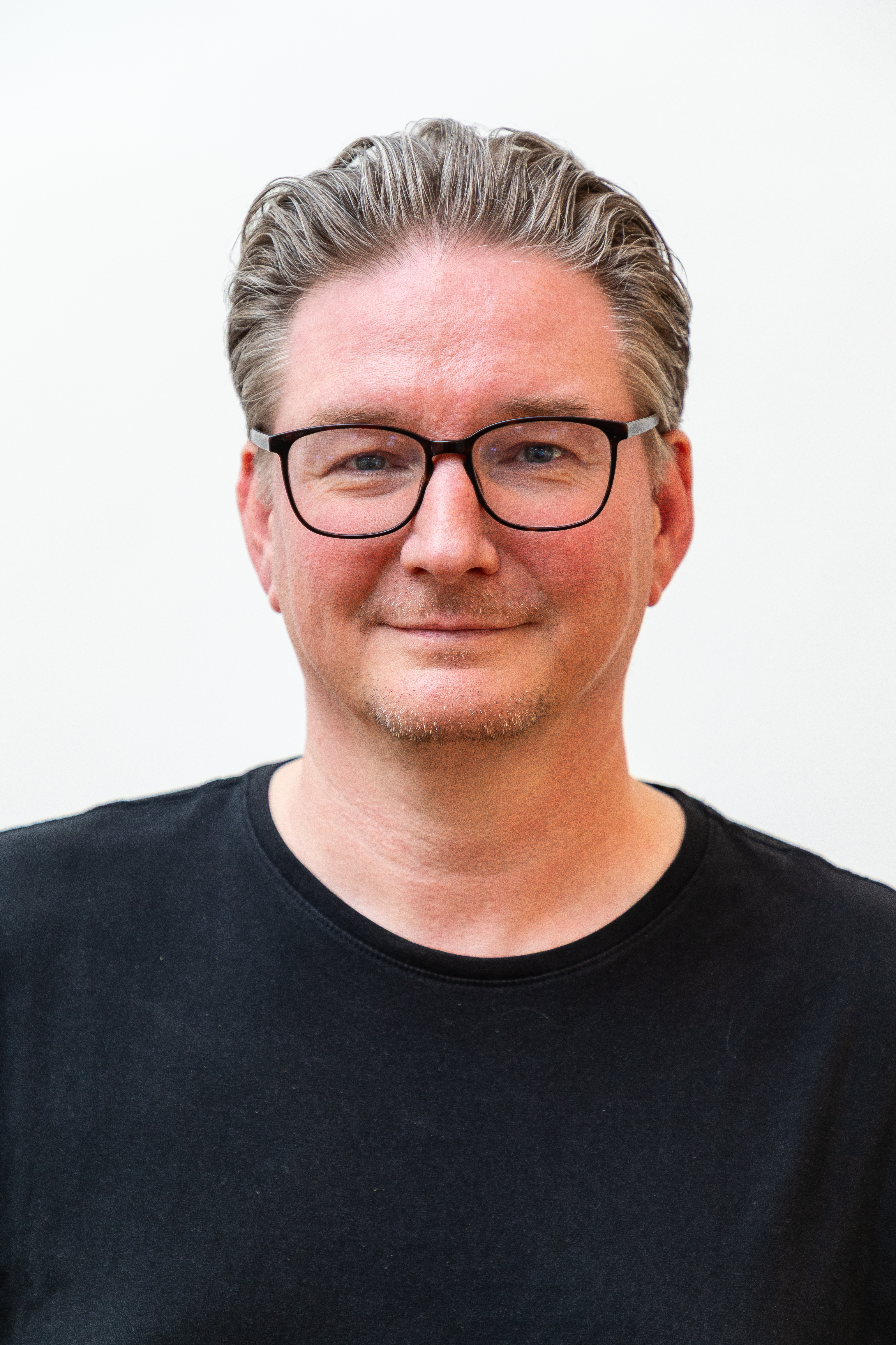 Billede af kirkebogsførende sognepræst Henrik Holmgaard